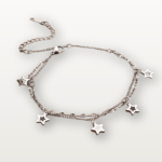 Celestial Charm Double Layer Bracelet featuring delicate star charms on a layered design, perfect for adding a touch of elegance and astrology-inspired style.