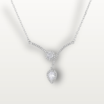 Close-up of a zircon pendant necklace with a sleek V-shaped design